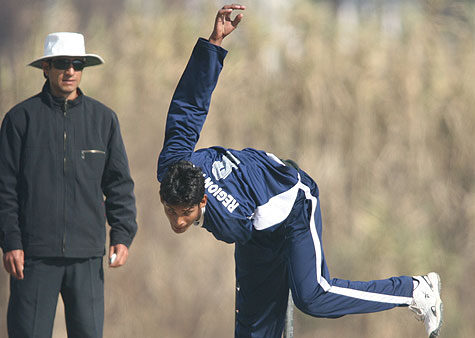 Saud Ahmed Ansari of Nepalgunj bowls in action against Biratnagar.