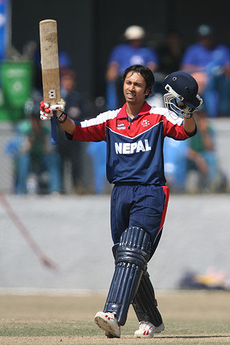 Sharad Vesarkar celebrates his century. Photo by NepalSportsPhoto.com
