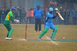 Dev Narayan Jha of Aishwarya Vidya Niketan plays a shot while NASA International's wicketkeeper Subash Pradhan looks on during their quarterfinal match of the Hotel Devotee SPA Cup Inter-College Cricket Tournament in Dhangadhi on Sunday.(Photo Courtesy: Mahesh Shah)