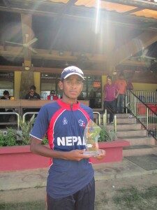 Avinash Karn with the best bowlers trophy. (Photo Courtesy: BIKRAM GIRI)