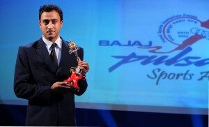 Paras Khadka pose for photo with the Pulsar Sports Award. He was adjudged player of the year (male).